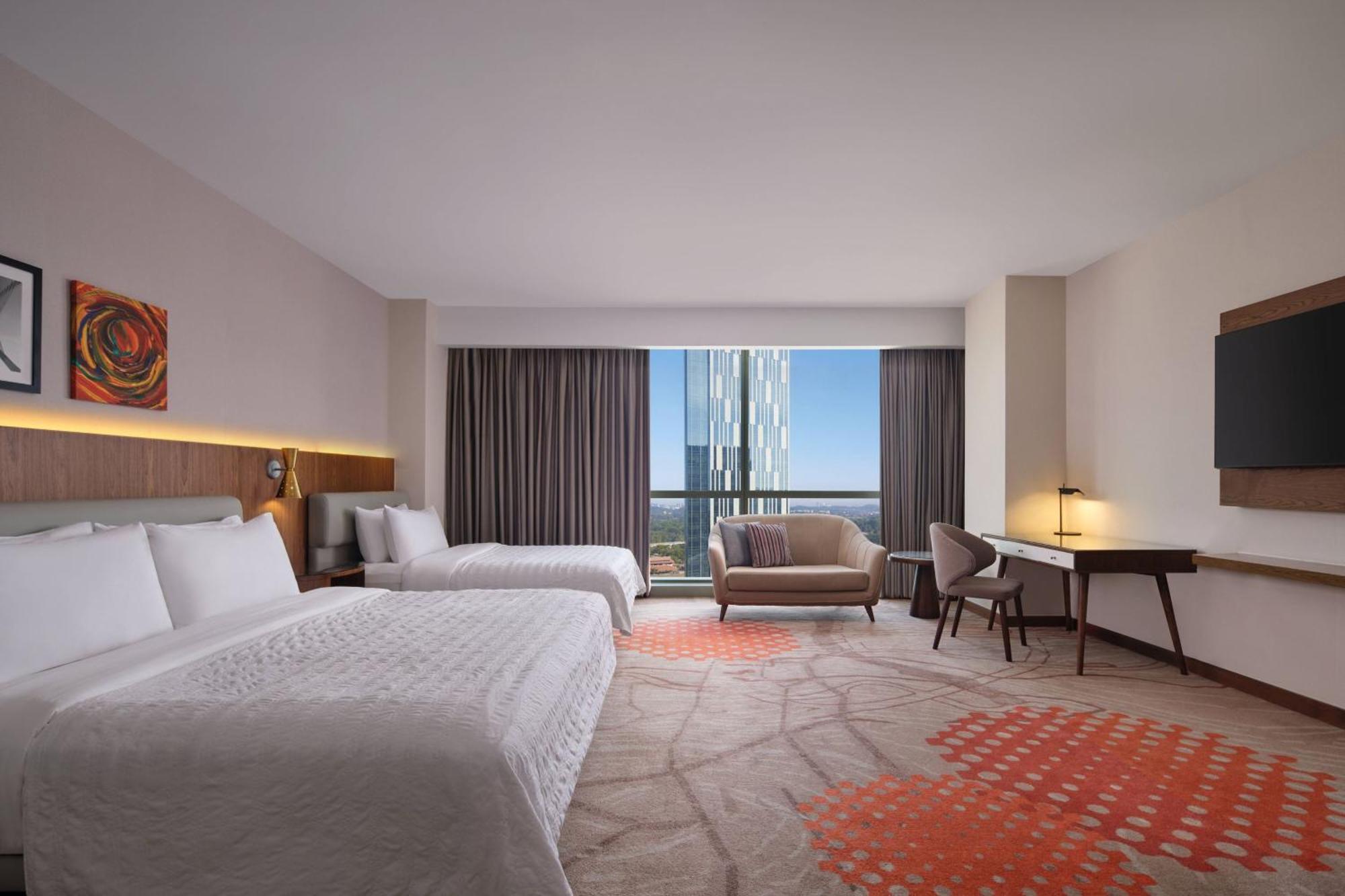 Le Meridien Putrajaya Kültér fotó A guest room at the hotel
